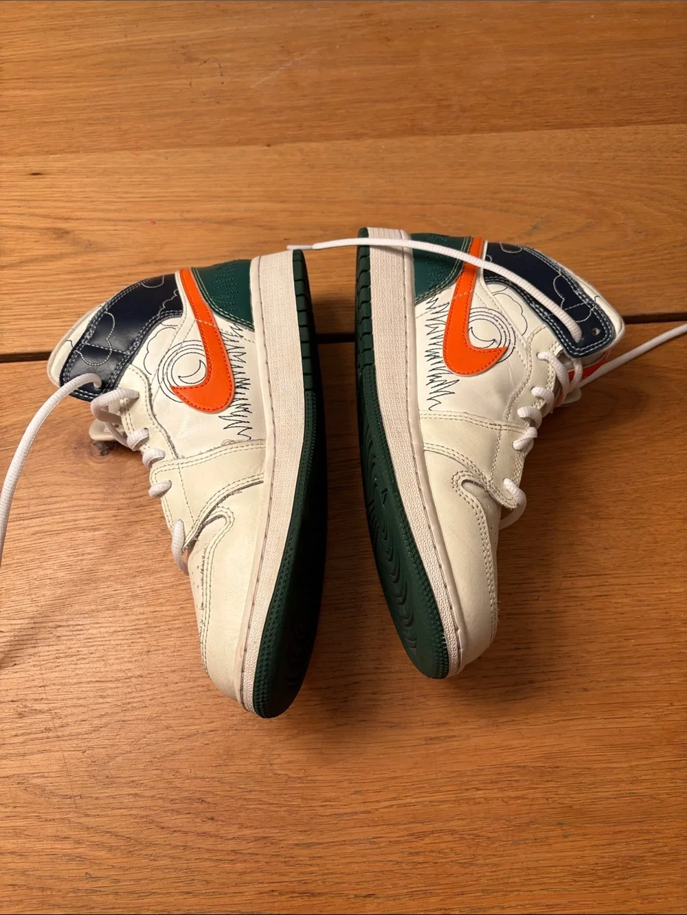 Kids White and Orange Basketball Shoes with Green Accent - Nike High Tops